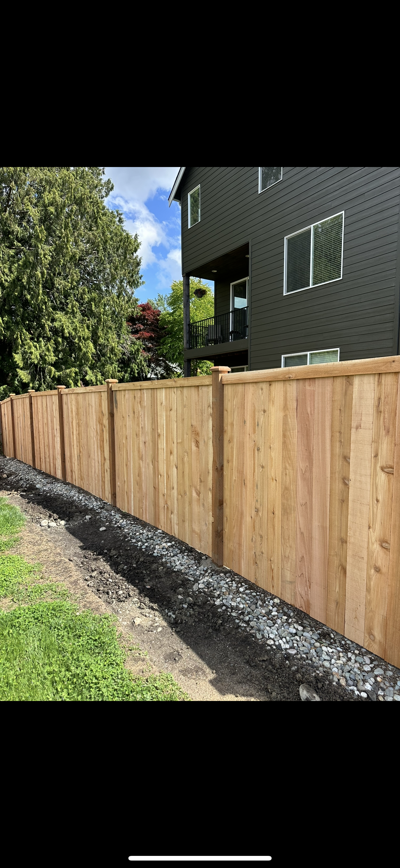 Cedar fence with landscaping